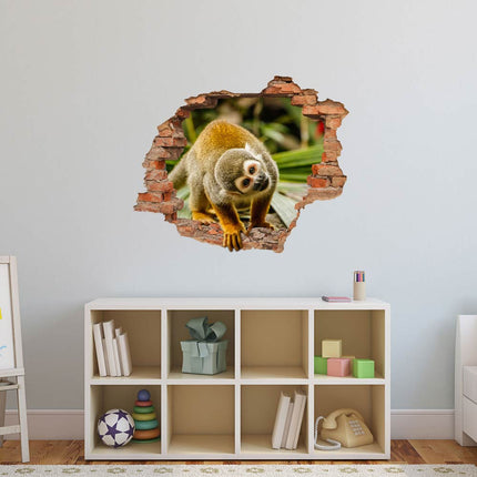 Wandaufkleber Wandtattoo in Form eines Wanddurchbruchs von einem Äffchen als Hauptbild im Kindezimmer über dem Spielzeugregal