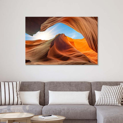 Leinwand in 3 Größen bis 120cm mit tollem Ausblick auf einen Canyon in Amerika. Dekoration in orange und blau über einer grauen Couch .