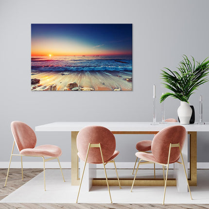 Bedruckter Canvas mit Holzrahmen und Sonnenaufgang am Meer. Die intensiven Orange und Blautöne sind ein toller Kontrast an einer weißen Wand im Essbereich oder im Schlafzimmer.