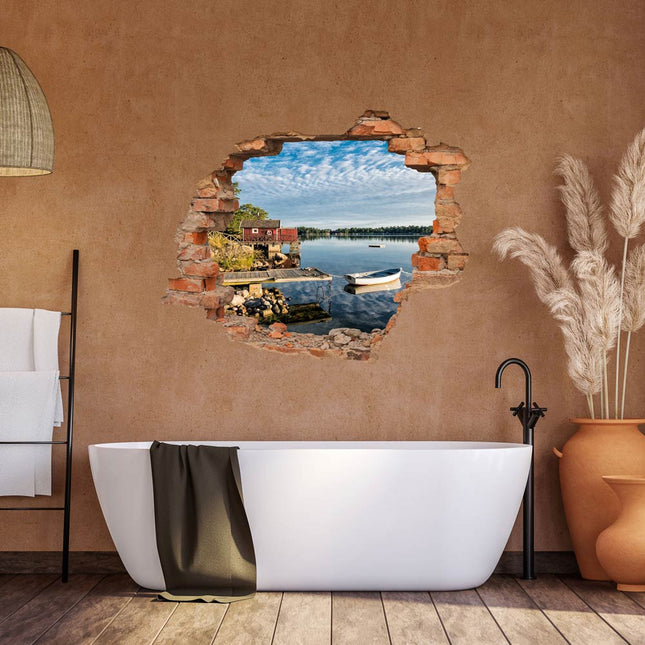 Wandaufkleber Wandtattoo in Form eines Wanddurchbruchs  mit Seeufer in Schweden als Hauptbild im Badezimmer mit orangener Wand über der Badewanne
