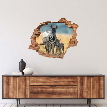 Wandaufkleber Wandtattoo in Form eines Wanddurchbruchs  von einem Zebra mit Fohlen als Hauptbild über der Kommode