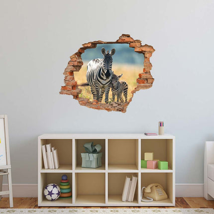 Wandaufkleber Wandtattoo in Form eines Wanddurchbruchs  von einem Zebra mit Fohlen als Hauptbild im Kinderzimmer über dem Spielzeugregal