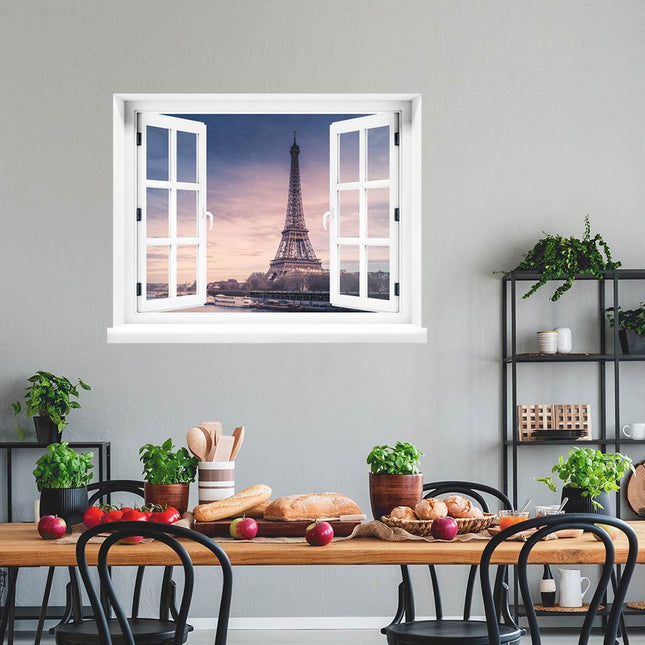 Tauchen Sie ein in die romantische Atmosphäre von Paris! Selbstklebendes Wandbild mit Fenstermotiv mit Ausblick auf den Eiffelturm beim Sonnenuntergang, dekorativ platziert über einem bunt gedeckten Küchentisch. Perfekt für Ferntäume und Urlaubsstimmung.
