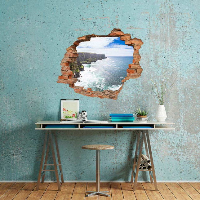 Wandaufkleber Wandtattoo in Form eines Wanddurchbruchs mit Atlantikküste als Hauptbild über einem Schreibtisch 